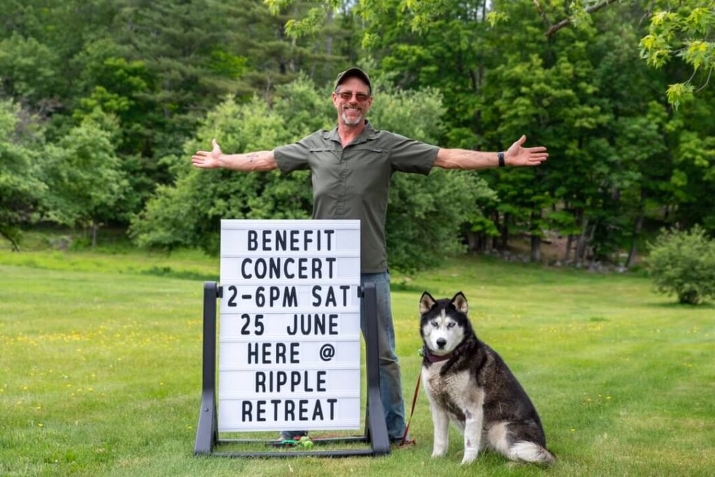 hero image JJ and his dog at the benefit concert